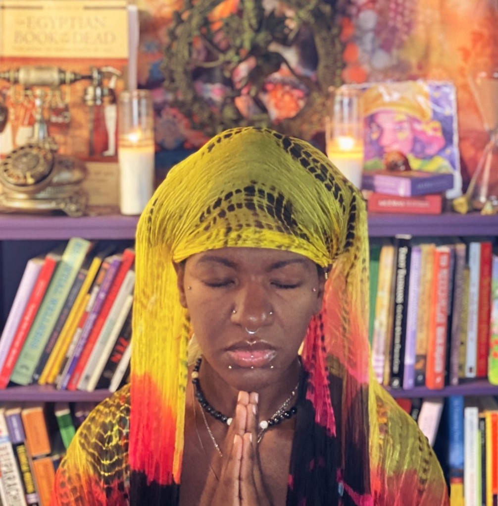 Mira Dee praying at her altar after an Ayahuasca retreat experience