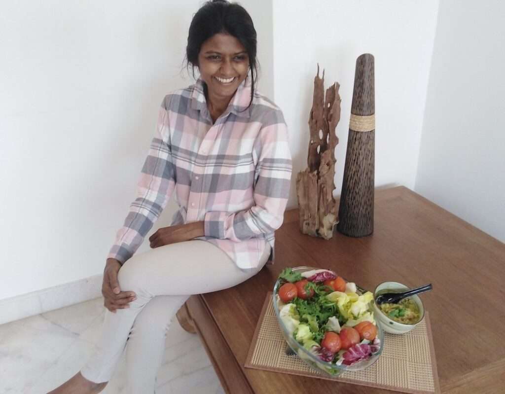 Nutritionist Ruha Thevi sits with a bowl of salad and talks about foods with no nutritional value