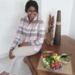 Nutritionist Ruha Thevi sits with a bowl of salad and talks about foods with no nutritional value