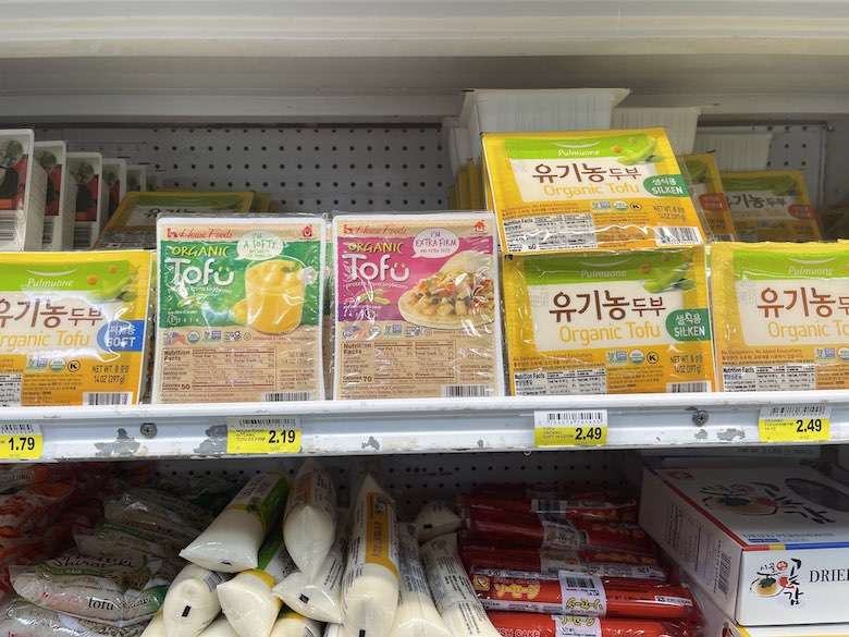 tofu lined up in grocery store