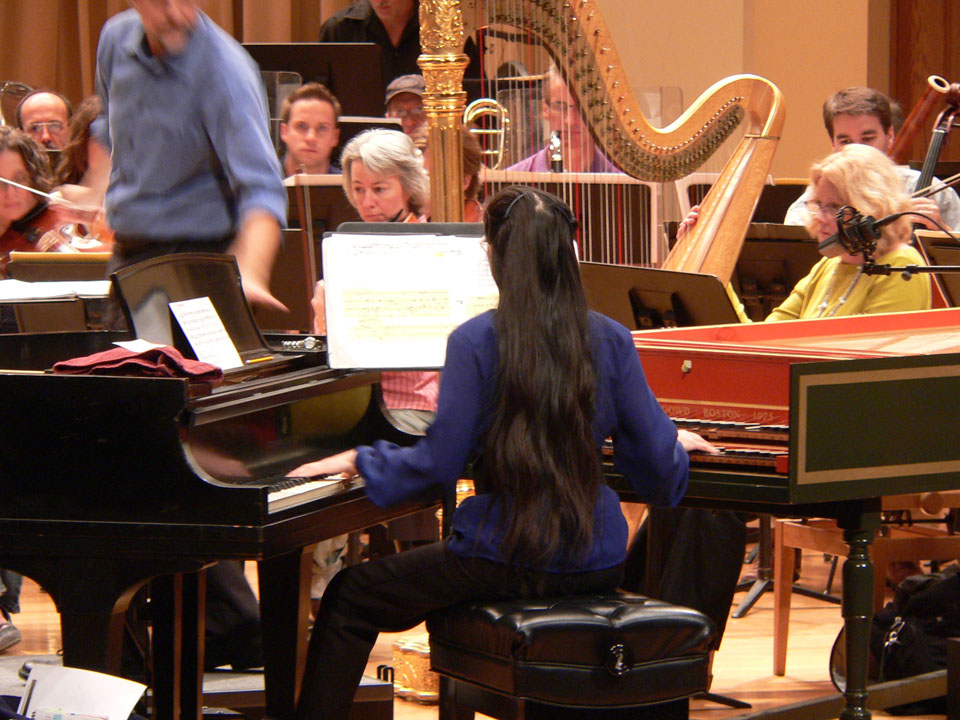 classical pianist Joanne Kong playing harpsichord